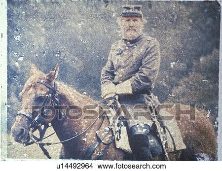 Picture - Soldier on horseback during Civil War reenactment of Battle of Bull run. Fotosearch