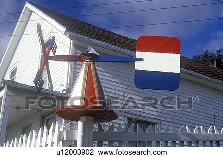 Stock Image - Dutch windmill weathervane. Fotosearch