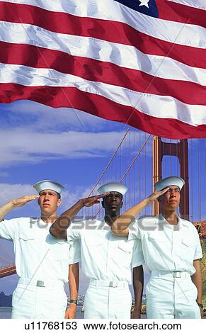 Stock Image - Ethnically diverse American sailors, American flag, Golden Gate Bridge. Fotosearch