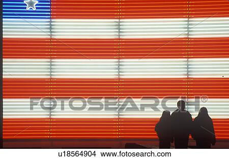 Silhouetted family in front of an American electric Flag View Large Photo Image Picture - Silhouetted family in front of an American electric Flag. Fotosearch