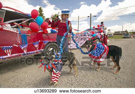 Woman with patriotic dogs at Fourth of July Parade View Large Photo Image Stock Photo - Woman with patriotic dogs at Fourth of July Parade. Fotosearch
