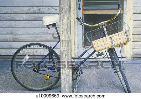 Bicycle parked on front porch View Large Photo Image Stock Photo - Bicycle parked on front porch. Fotosearch