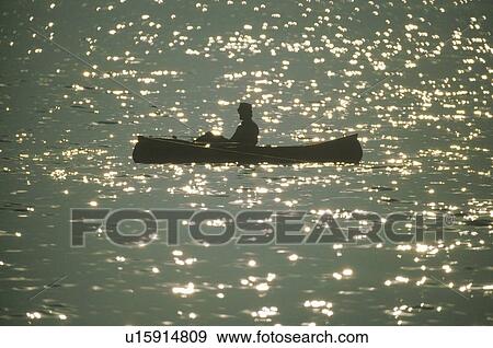 Canoeist on Lake View Large Photo Image Stock Photo - Canoeist on Lake. Fotosearch
