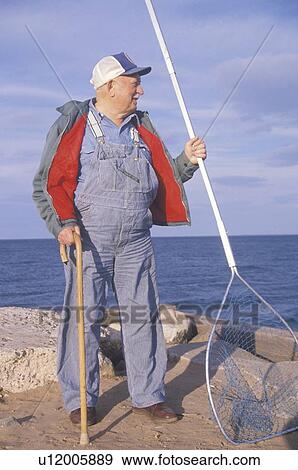 Older Fisherman with net View Large Photo Image Stock Photo - Older Fisherman with net. Fotosearch