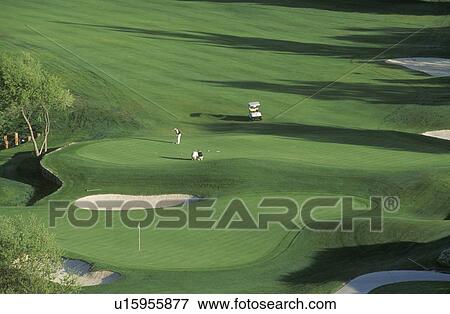 Stock Photo - Scenic overview of Greens, Golf Course. Fotosearch