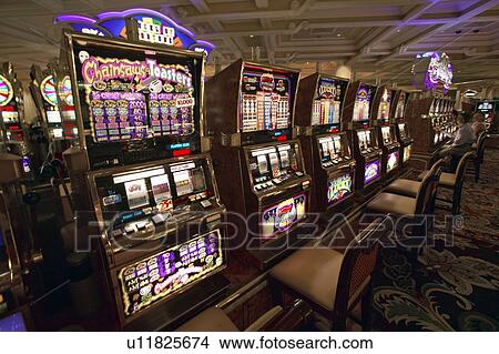 Slot machines in gambling casino in Las Vegas, NV View Large Photo Image Picture - Slot machines in gambling casino in Las Vegas, NV. Fotosearch