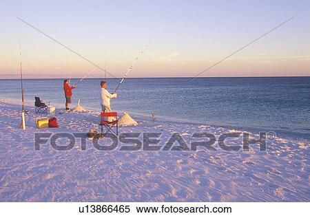 Two people deep sea fishing View Large Photo Image Stock Photography - Two people deep sea fishing. Fotosearch