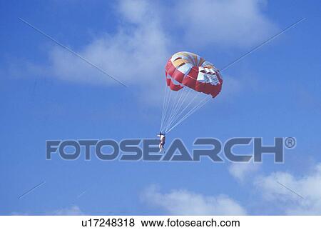 Stock Photo - Water Skiing Parachuting. Fotosearch