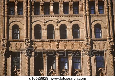 Stock Photo - Ornamental windows, Wall Street, NY City, NY. Fotosearch
