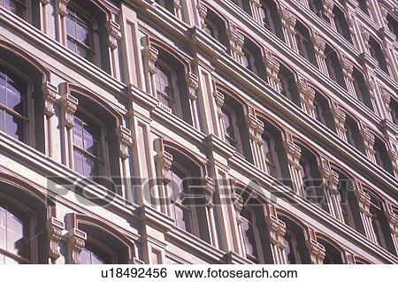 Stock Photograph - Ornamental windows, Wall Street, NY City, NY. Fotosearch