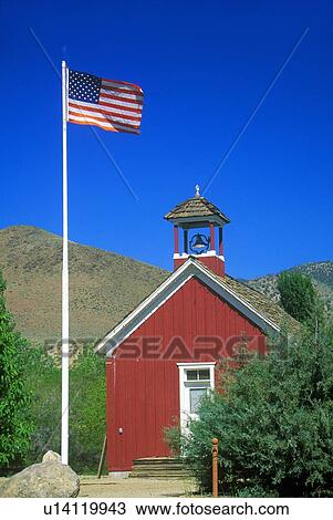 American flag waving above one room schoolhouse View Large Photo Image Stock Image - American flag waving above one room schoolhouse. Fotosearch
