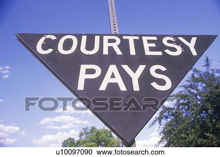 A sign that reads “Courtesy pays” View Large Photo Image Stock Image - A sign that reads “Courtesy pays”. Fotosearch