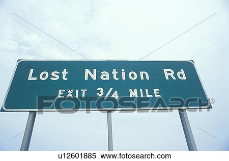 A sign that reads “Lost Nation Rd - Exit 3/4 mile” View Large Photo Image Stock Photography - A sign that reads “Lost Nation Rd - Exit 3/4 mile”. Fotosearch