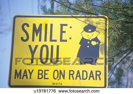 Stock Photograph - A sign that reads “Smile; you may be on radar”. Fotosearch