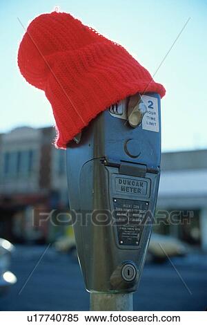 Parking meter wearing a red wool cap View Large Photo Image Stock Photography - Parking meter wearing a red wool cap. Fotosearch