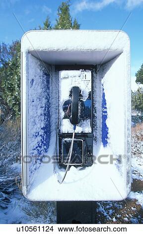 Pay telephone covered in snow View Large Photo Image Picture - Pay telephone covered in snow. Fotosearch