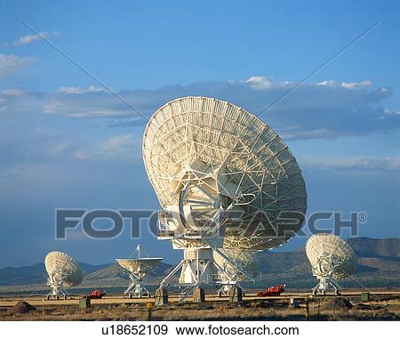 Stock Photo - Satellite dishes facing skyward . Fotosearch