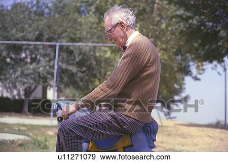Senior citizen at the park View Large Photo Image Stock Photo - Senior citizen at the park. Fotosearch