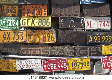 Vintage old license plates View Large Photo Image Stock Photo - Vintage old license plates. Fotosearch