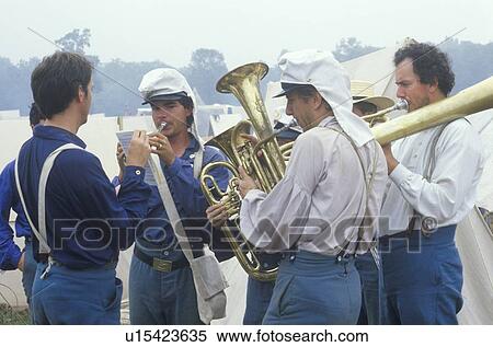 Confederate participants playing instruments during recreation of Battle of Manassas, marking the beginning of the Civil War View Large Photo Image Stock Photography - Confederate participants playing instruments during recreation of Battle of Manassas, marking the beginning of the Civil War. Fotosearch