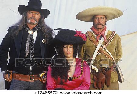 Historical participants posing as gunfighters and saloon workers View Large Photo Image Stock Image - Historical participants posing as gunfighters and saloon workers. Fotosearch