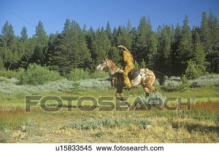 Stock Photography - Living History participants in wagon train. Fotosearch