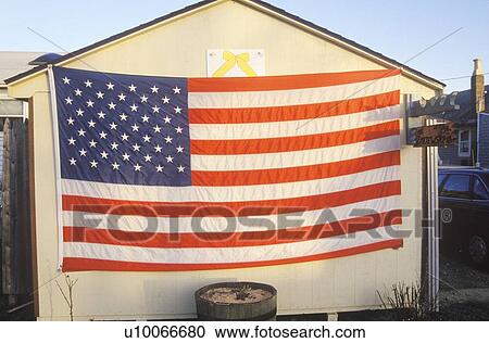 American Flag and Yellow Ribbon Hung on Shed View Large Photo Image Stock Image - American Flag and Yellow Ribbon Hung on Shed. Fotosearch