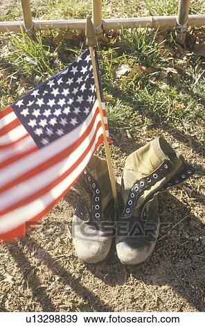 Stock Photo - American Flag Between Two Army Boots. Fotosearch
