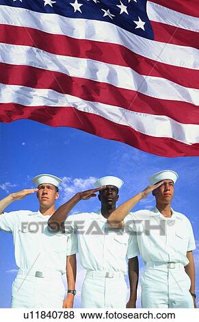Stock Photo - Ethnically diverse American sailors and American flag. Fotosearch