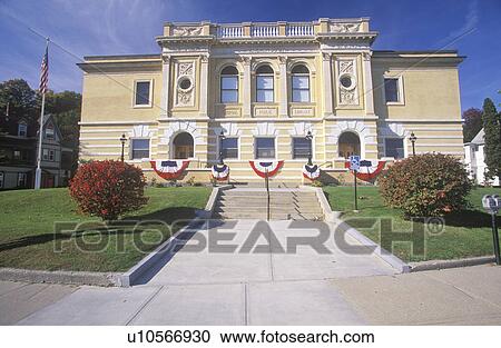 Stock Image - Small mansion draped with Bunting. Fotosearch