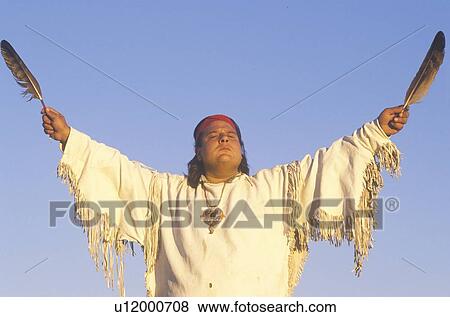 Stock Photo - A Native American performing an Earth ceremony. Fotosearch