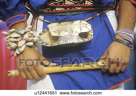 Close-up of turtle shell worn on the waist of a man holding flute during Corn Dance ceremony View Large Photo Image Stock Image - Close-up of turtle shell worn on the waist of a man holding flute during Corn Dance ceremony. Fotosearch
