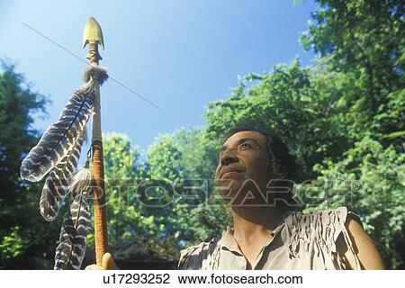 Native American Cherokee holding a spear, Tsalagi Village View Large Photo Image Stock Image - Native American Cherokee holding a spear, Tsalagi Village. Fotosearch