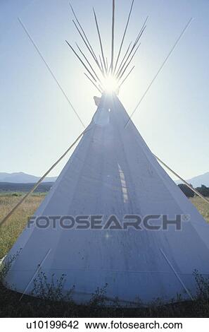 Stock Image - Teepee and sunburst. Fotosearch