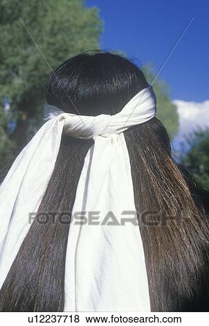 Stock Photo - The rear view of a white head band on a Native American Cherokee. Fotosearch