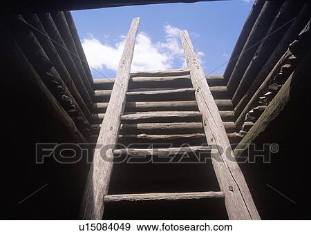 Stock Photo - Wooden ladder leading to mud roof of the Spanish Mission, Pecos National Historical Park. Fotosearch