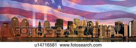 Stock Image - Manhattan skyline, World Trade Center Light Memorial, American flag. Fotosearch