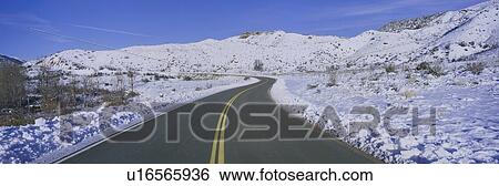 Stock Photograph - Panoramic view of winter snow in the Los Padres National Forest Wilderness area. Fotosearch