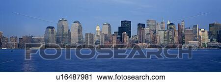 Panoramic sunset view of Lower Manhattan skyline, NY where World Trade Towers were located View Large Photo Image Stock Image - Panoramic sunset view of Lower Manhattan skyline, NY where World Trade Towers were located. Fotosearch