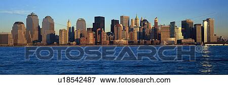 Panoramic sunset view of Lower Manhattan skyline View Large Photo Image Stock Photo - Panoramic sunset view of Lower Manhattan skyline. Fotosearch