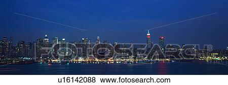 Panoramic view of Empire State Building and Manhattan, NY skyline with Hudson River and harbor View Large Photo Image Stock Photo - Panoramic view of Empire State Building and Manhattan, NY skyline with Hudson River and harbor. Fotosearch