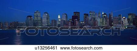 Panoramic view of Lower Manhattan skyline at sunset View Large Photo Image Stock Image - Panoramic view of Lower Manhattan skyline at sunset. Fotosearch