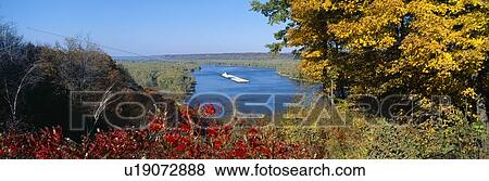 Stock Photo - Barge on Mississippi River in Autumn, Great River Road. Fotosearch