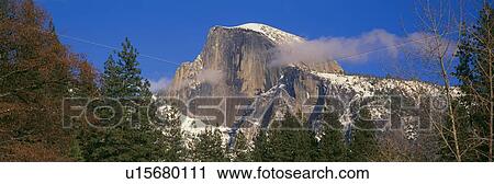 Stock Image - Panoramic view of Half Dome in Yosemite Valley National Park. Fotosearch