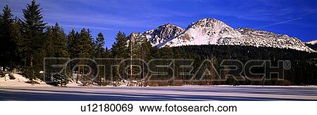 Stock Photo - Snow covered lake at Lassen Volcanic National Park. Fotosearch