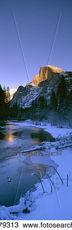 Stock Image - Sunset over Merced River and Half Dome, Yosemite. Fotosearch
