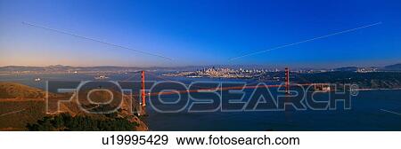 View of the Golden Gate Bridge and city skyline at sunset from the Marin Headlands View Large Photo Image Stock Photo - View of the Golden Gate Bridge and city skyline at sunset from the Marin Headlands. Fotosearch