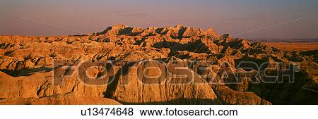 Sunset panoramic view of mountains in Badlands National Park View Large Photo Image Stock Photo - Sunset panoramic view of mountains in Badlands National Park. Fotosearch