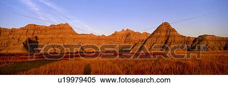 Sunset panoramic view of mountains in Badlands National Park View Large Photo Image Stock Photography - Sunset panoramic view of mountains in Badlands National Park. Fotosearch