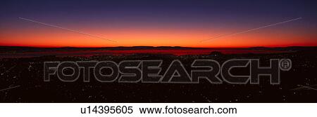 Stock Photography - View of the San Francisco Bay Area at sunrise from Twin Peaks. Fotosearch